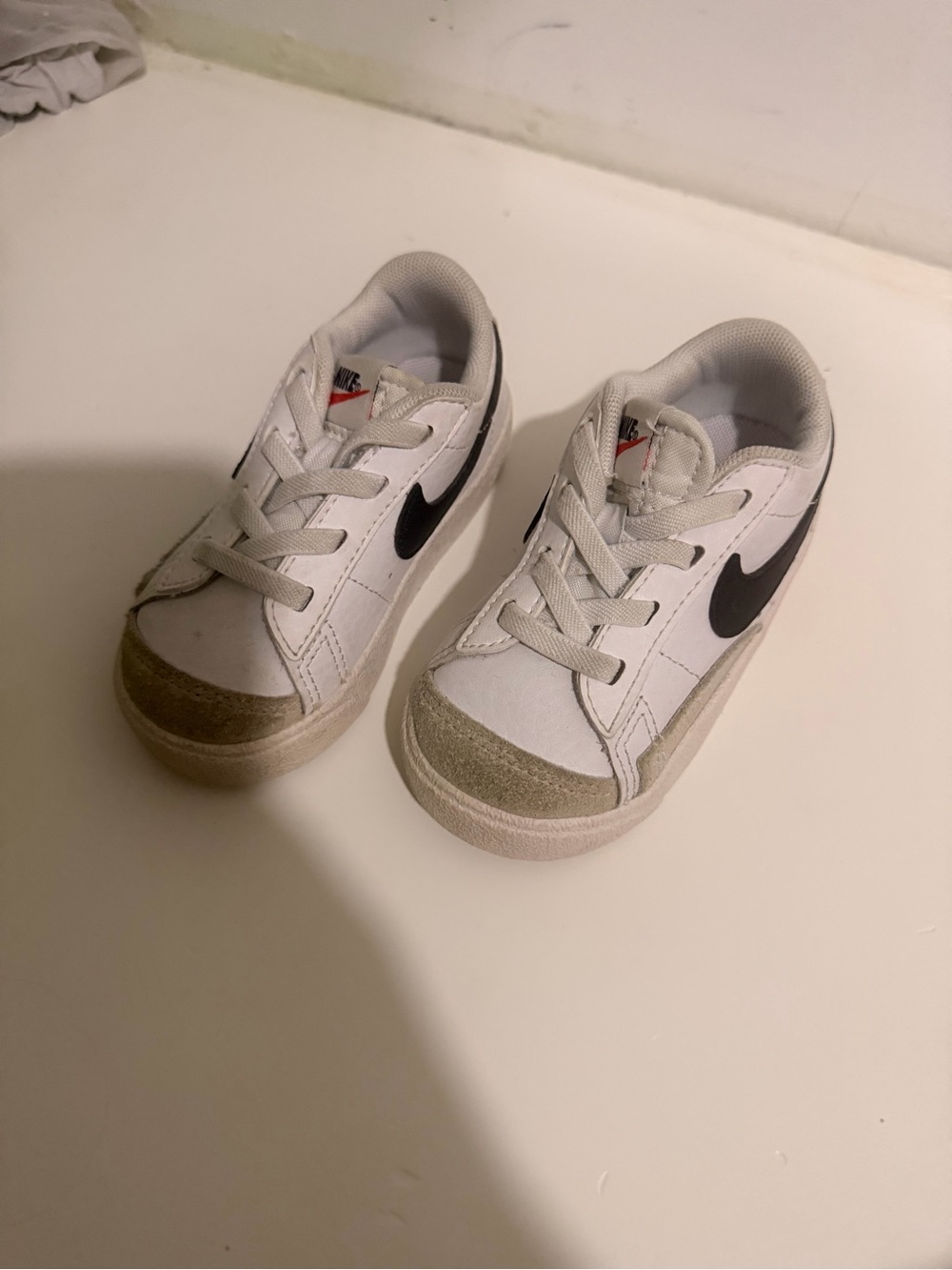Nike Kids White Sneakers with Black Swoosh and Tan Suede Toe
